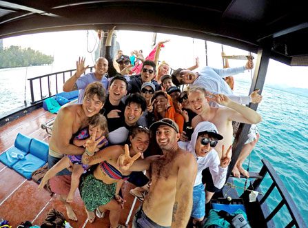 A group of guests posing for a selfie on a Krabi Sunset Cruise