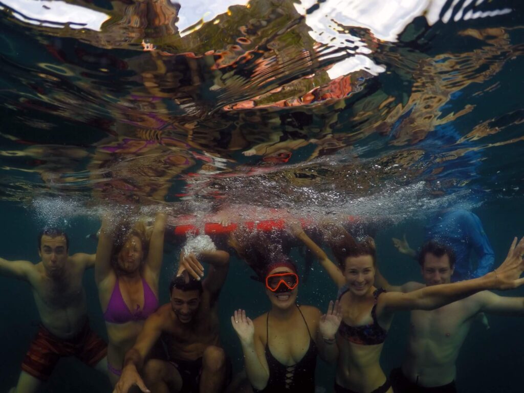 underwater boat photos from krabi tours with snorkellers in the foreground