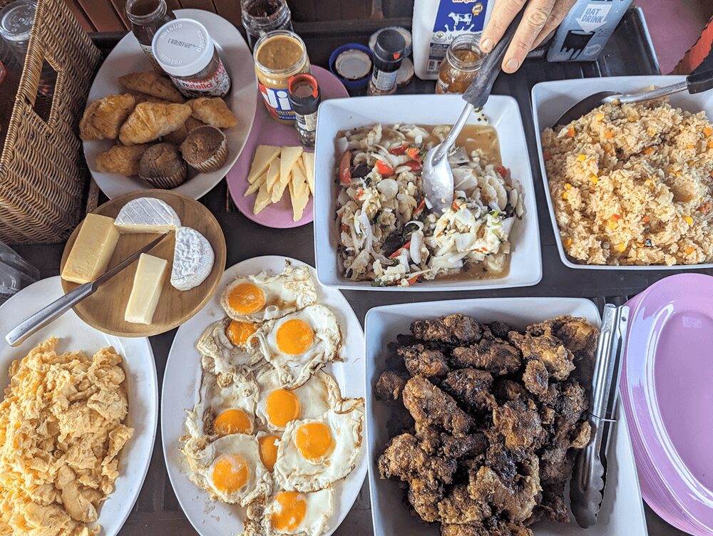 a selection of breakfast foods in aonang aboard krabi sunset cruises