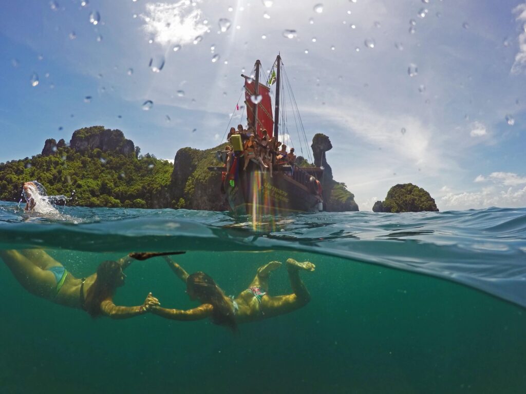 two girls snorkelling at chicken island